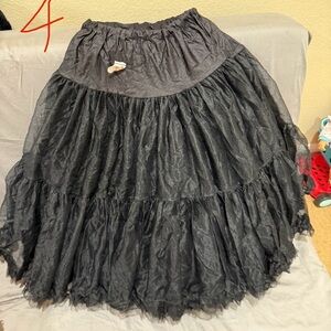 Malco Modes black mid calf length petticoat size S